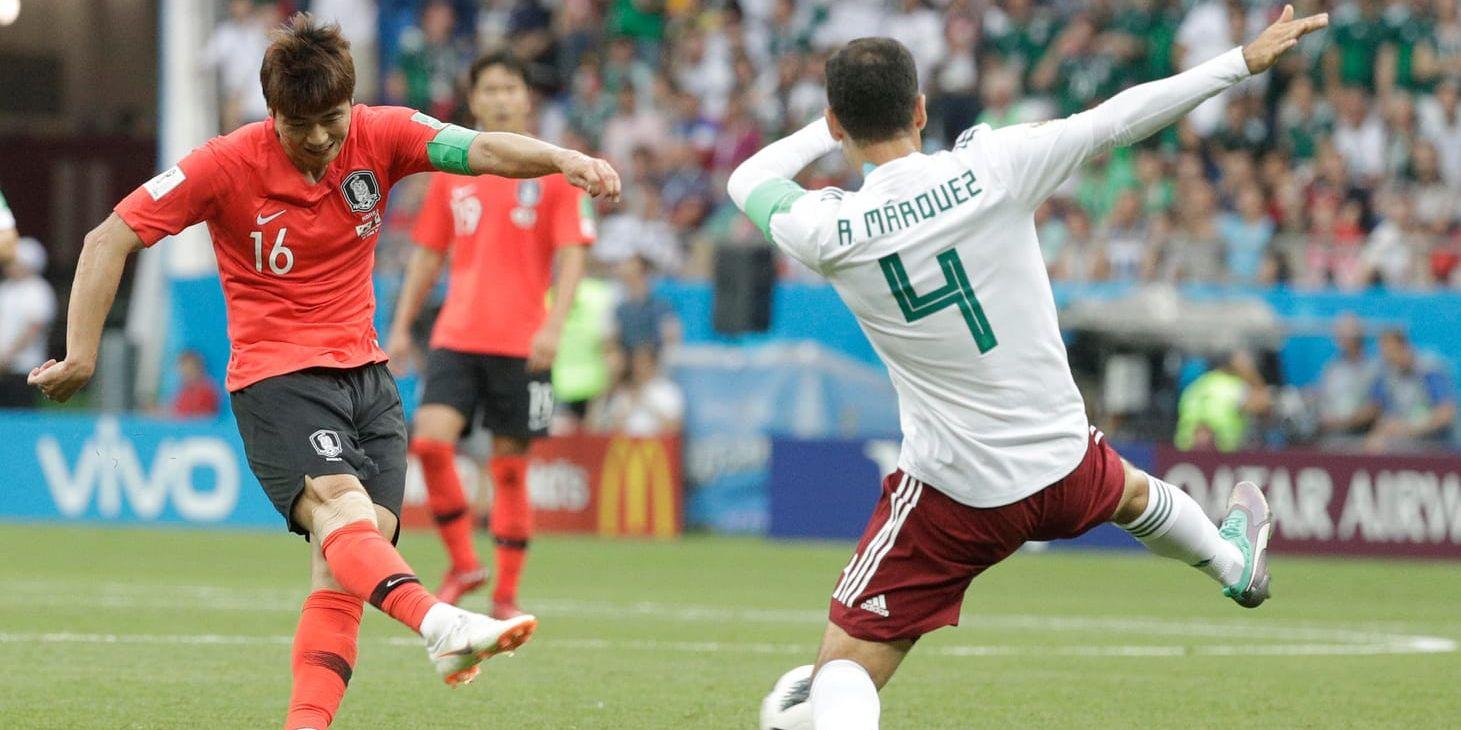 Sydkoreas lagkapten Ki Sung-Yueng, till vänster, missar lagets avgörande gruppspelsmatch i fotbolls-VM mot Tyskland.