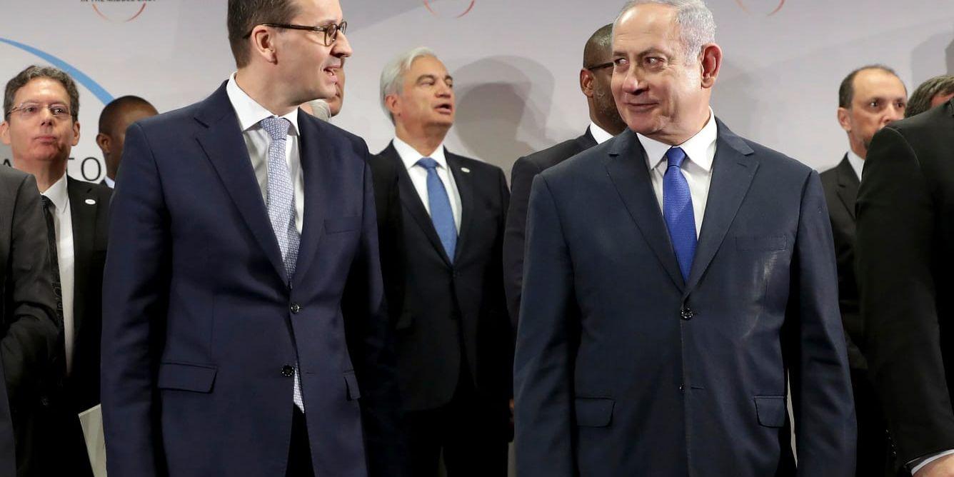 Polens premiärminister Mateusz Morawiecki (till vänster) och Israels premiärminister Benjamin Netanyahu vid ett tidigare möte i år. Arkivbild.
