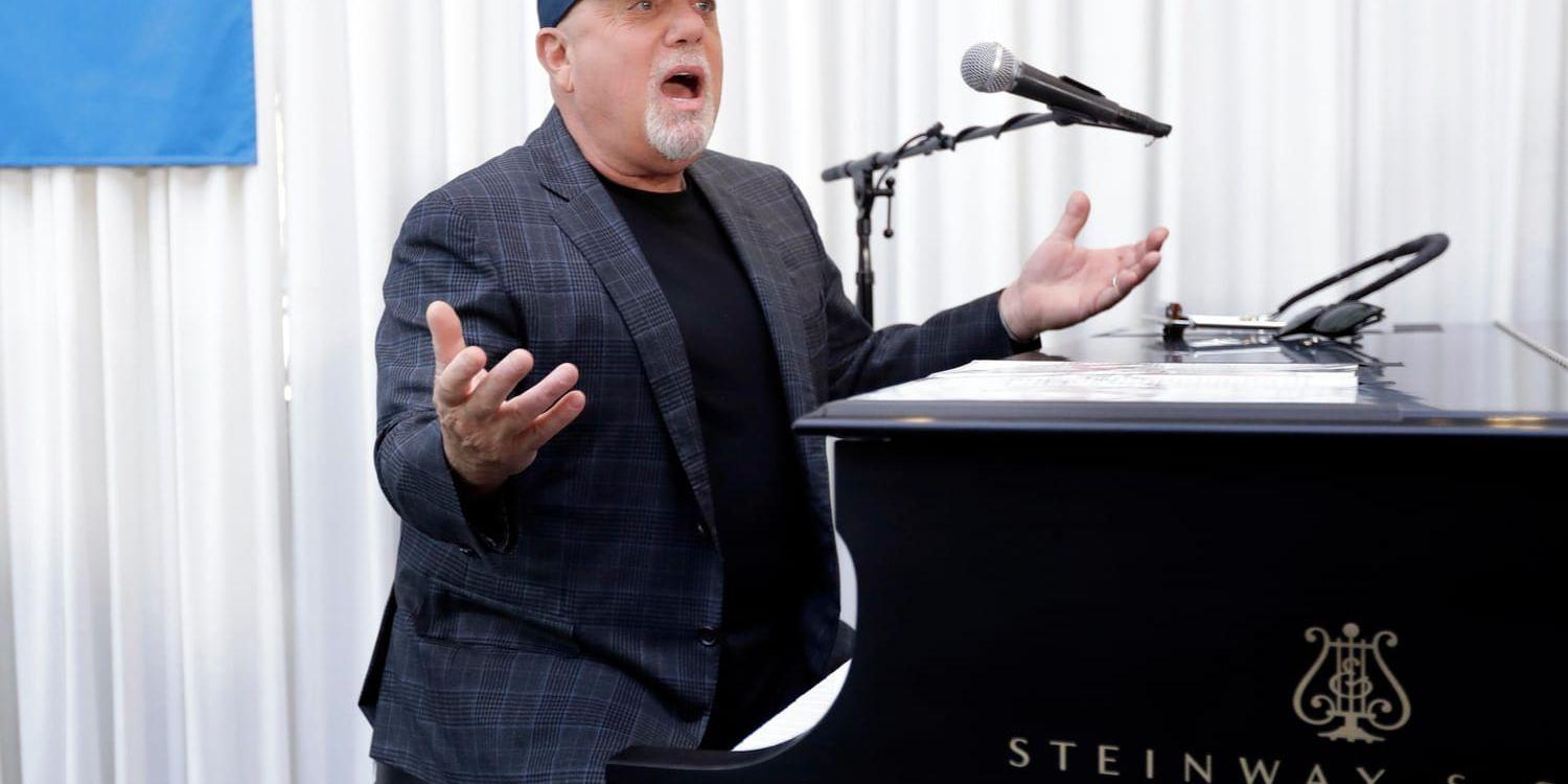 Billy Joel hade pianot med vid onsdagens presskonferens.