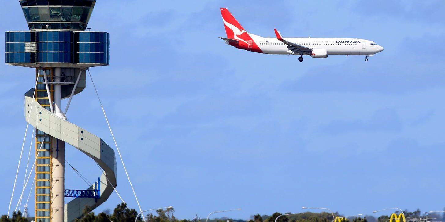Ett flygplan landar i Sydney i Australien. Arkivbild.