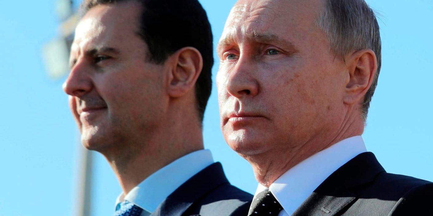 Syriens president Bashar al-Assad och Rysslands president Vladimir Putin. Arkivbild.