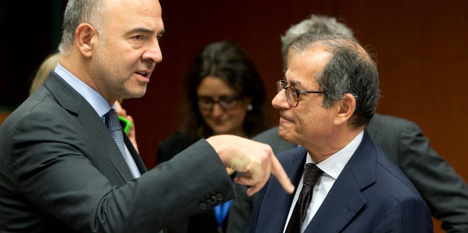 EU:s finanskommissionär Pierre Moscovici och Italiens finansminister Giovanni Tria. Arkivfoto.