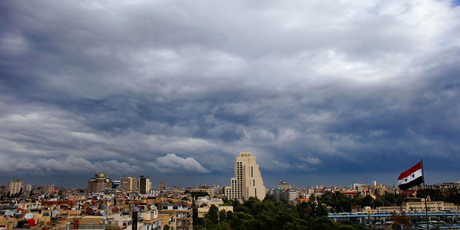 Ett molnigt Damaskus fotograferat i december 2016. Arkivbild.