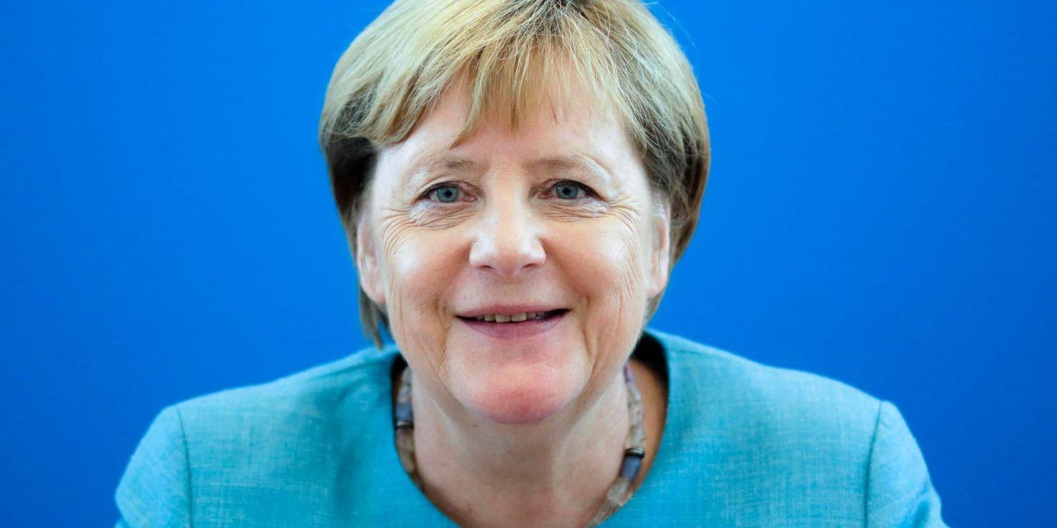 Tysklands förbundskansler Angela Merkel kan glädja sig åt stark tysk ekonomi, men får samtidigt kritik för densamma. Arkivbild.