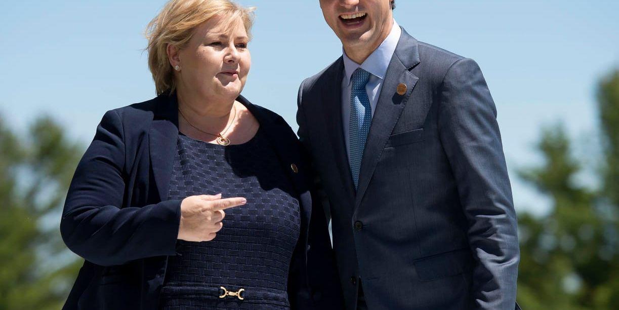 Kanadas premiärminister Justin Trudeau välkomnar Norges Erna Solberg till G7-mötet i Quebec.
