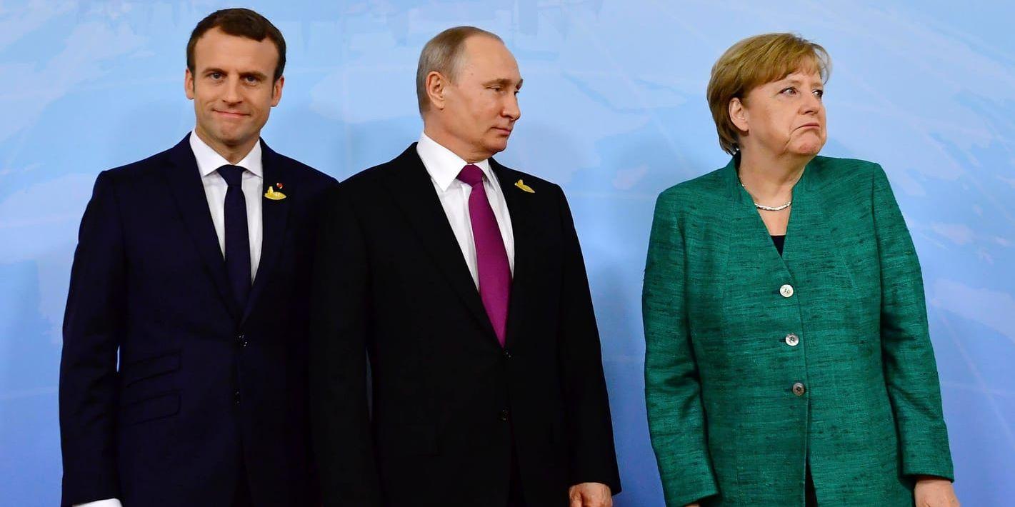 Frankrikes president Emmanuel Macron, Rysslands president Vladimir Putin och Tysklands förbundskansler Angela Merkel ska mötas och diskutera situationen i Syrien. Arkivbild.