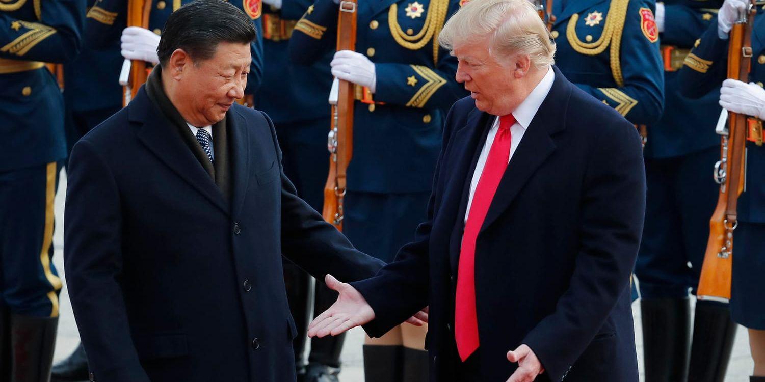 Den kinesiske presidenten Xi Jinping och USA:s president Donald Trump i Peking 2017. Rykten om att presidenterna kan skriva under ett nytt handelsavtal i mars lyfte de asiatiska börserna.