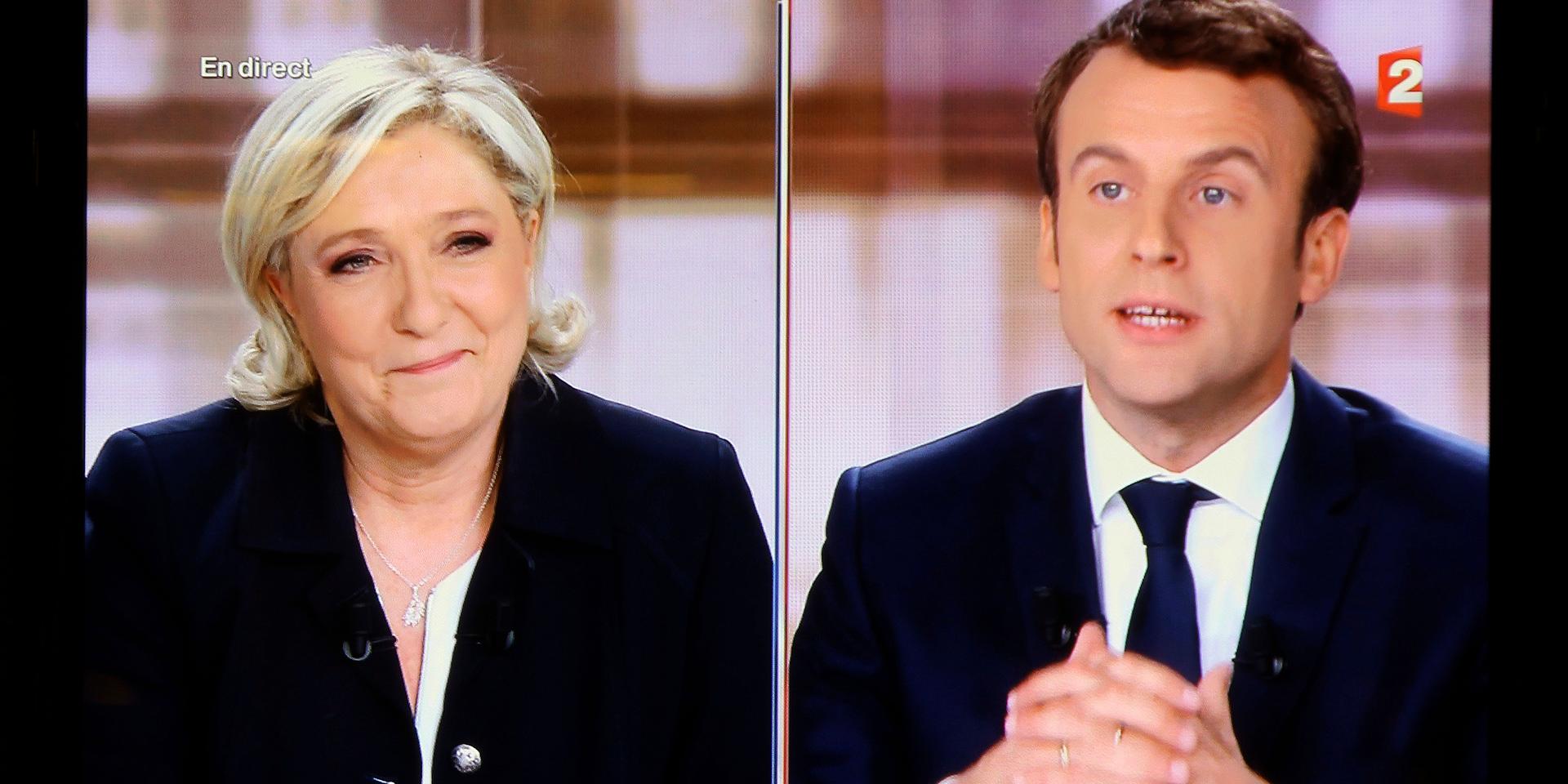Marine Le Pen och Emmanuel Macron i tv-debatt inför den avgörande omgången i franska presidentvalet 2017. Mycket tyder på att duon möter varandra på nytt i nästa års val. Arkivfoto.