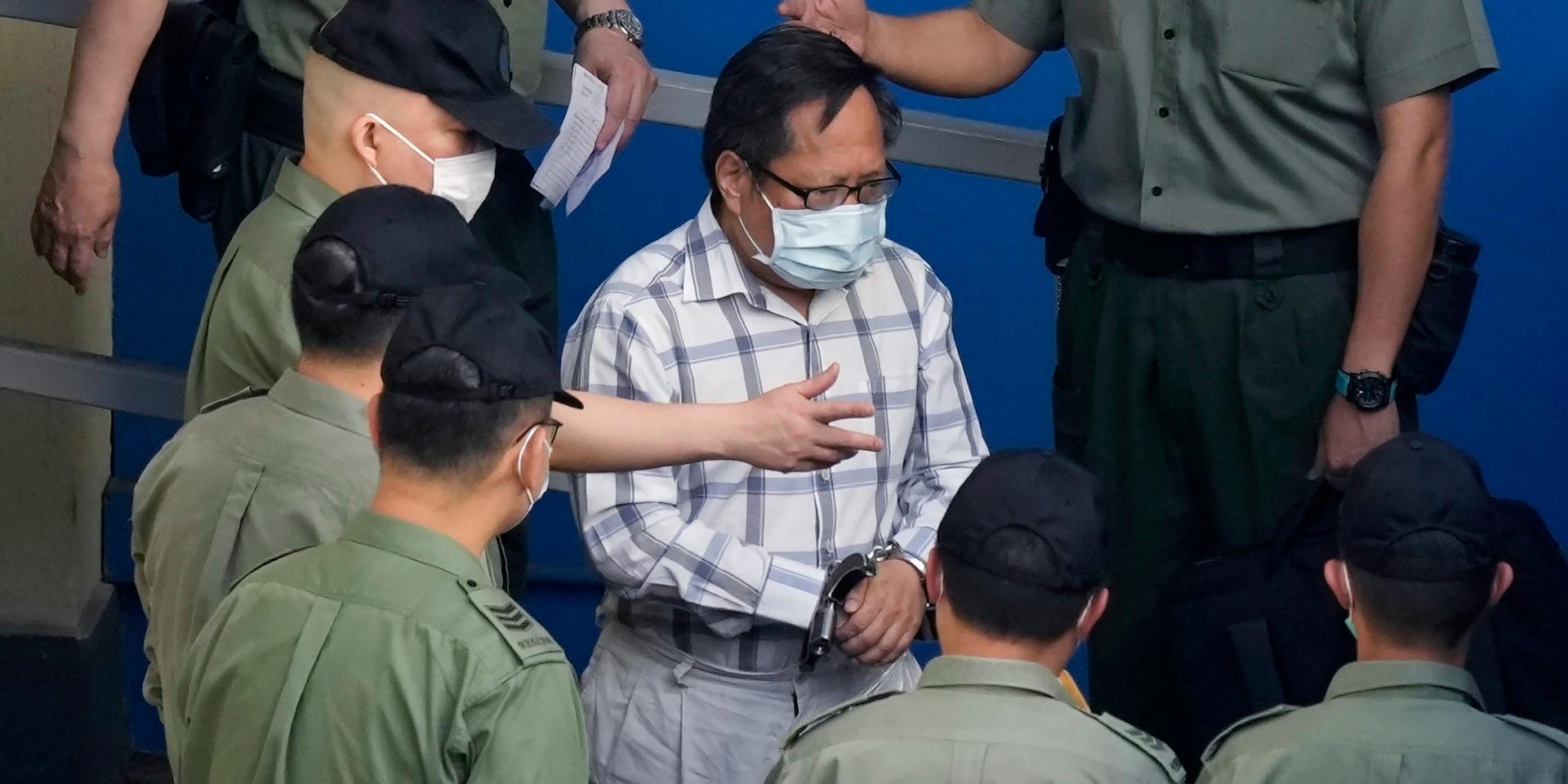 En av demokratiaktivisterna, Albert Ho, döms till tio månader i fängelse. Bilden är från i maj i år.