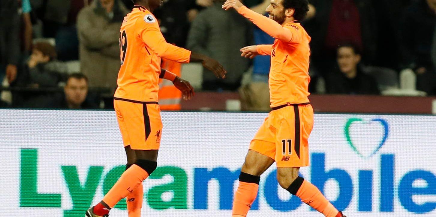 Saido Mané och Mohamed Salah firar efter ett av två målgivande samarbeten i mötet med West Ham.