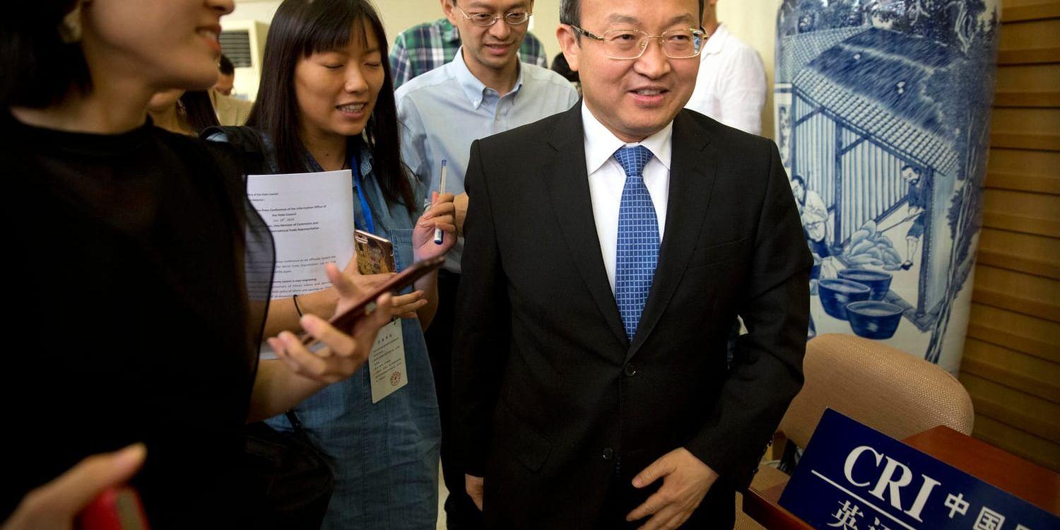 Wang Shouwen. Bild från en presskonferens i Peking i juni.