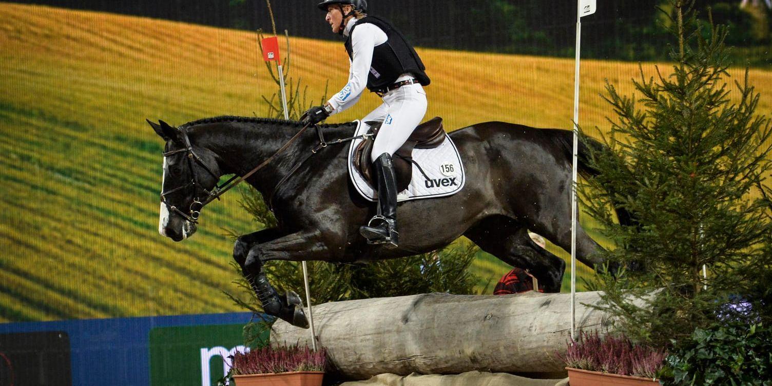 Tysklands Ingrid Klimke på hästen Parmenides vann både individuellt och i lag. Arkivbild
