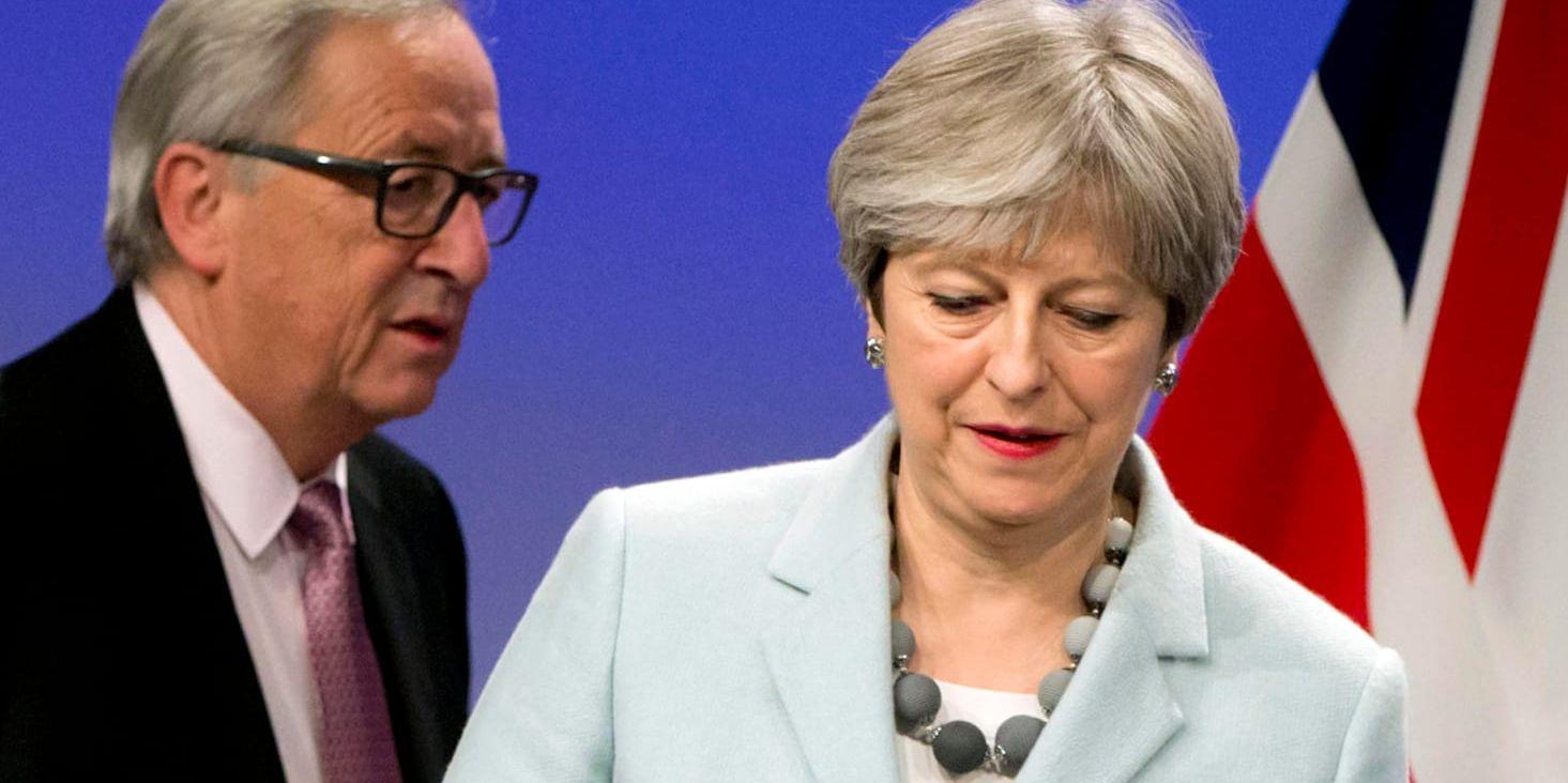 EU-kommissionens ordförande Jean-Claude Juncker och Storbritanniens premiärminister Theresa May i Bryssel.